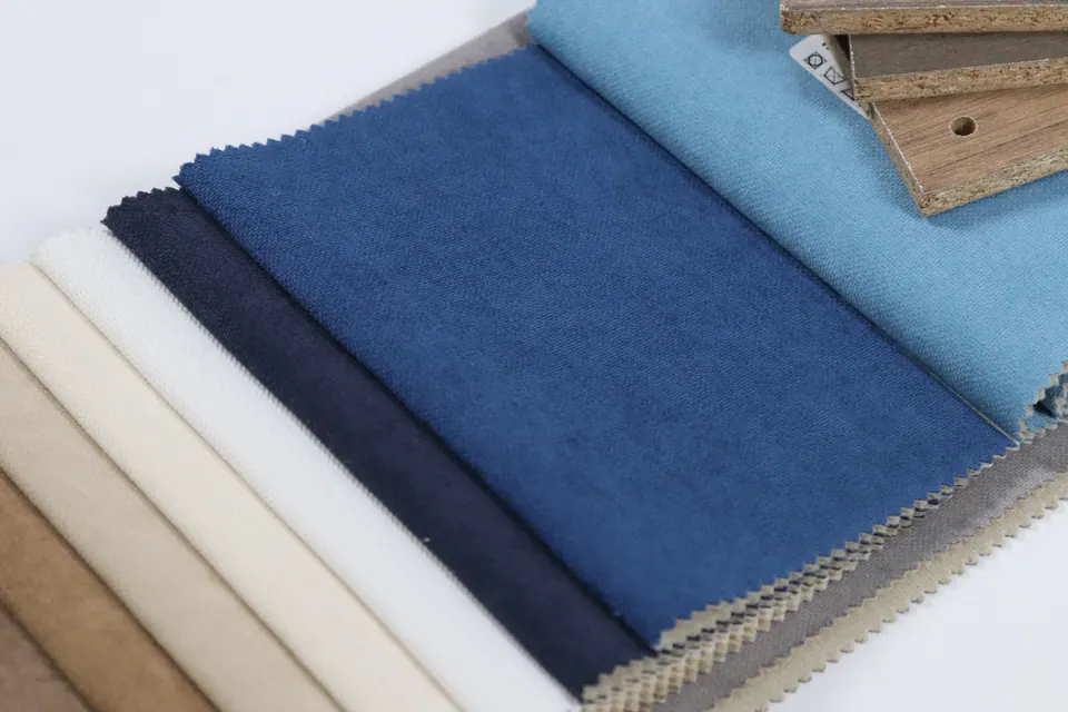Cobalt royal blue linen-look swatch with navy, white and sand strips and a drilled wood sample